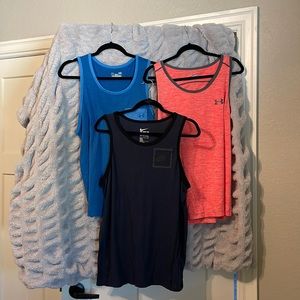 Size Large Men’s workout tanks